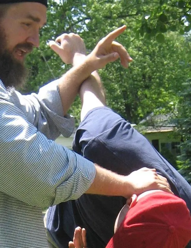 Dr. Micah Naziri practicing an outdoor partner control