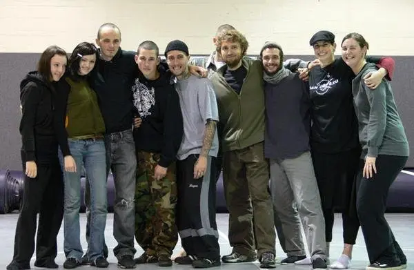 Dr. Micah Naziri with fellow martial artists during his early training years